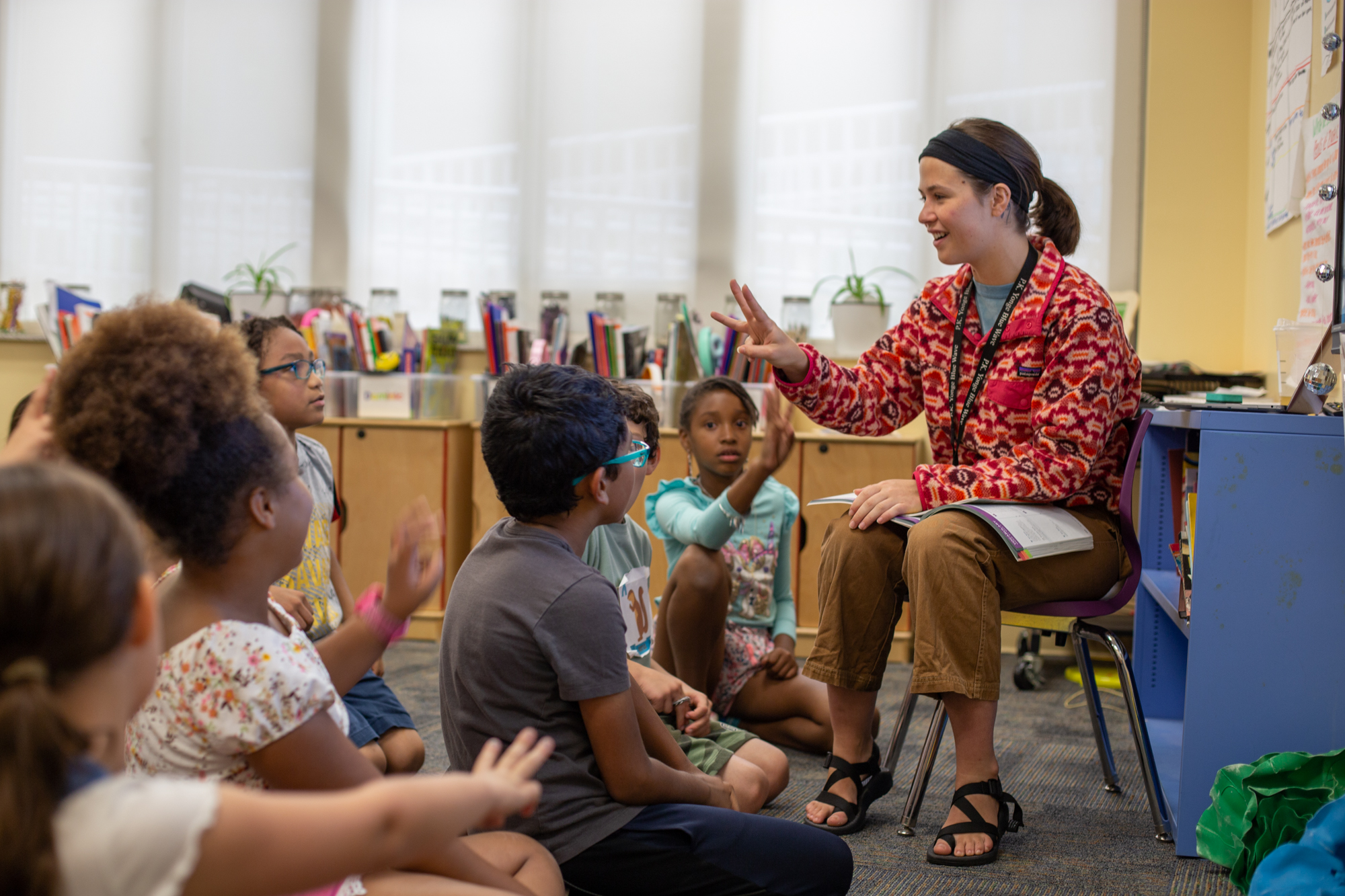 23 PKY-96 Teacher speaking to group of students