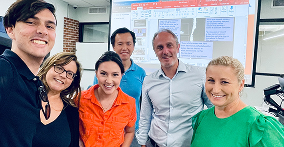 Zoe Larson, Miss UF, and Family visit the lab